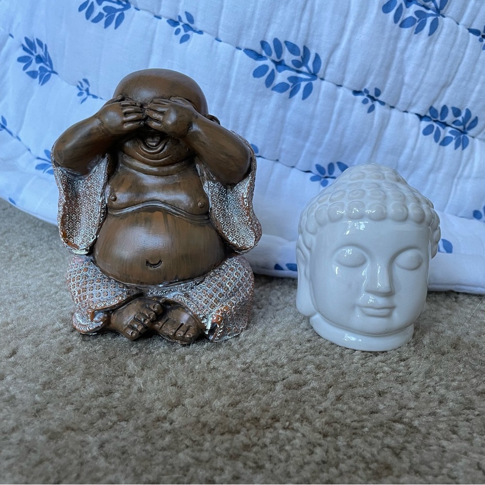 2 Buddha figurines